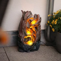 Solar Zierbrunnen im dekorativen Wurzeldesign und LED Licht